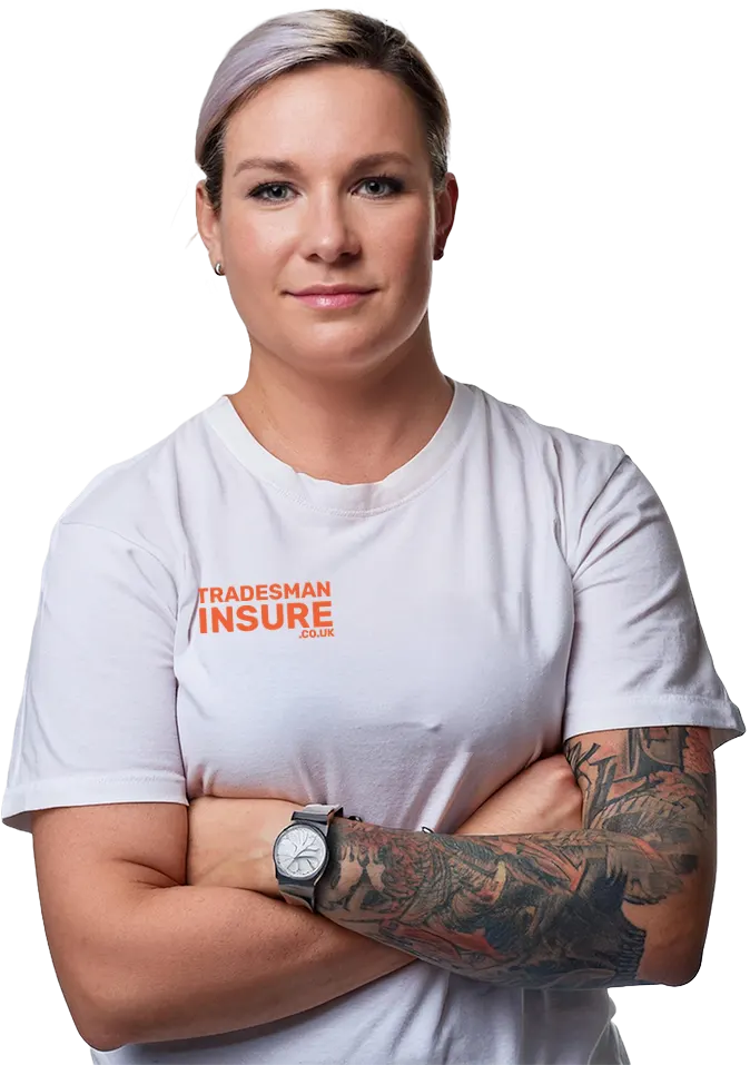 Tradeswoman in a TradesmanInsure t-shirt with her arms folded